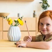beautiful small redhead girl drawing in notebook a 2021 09 29 20 22 44 utc 705x471 1
